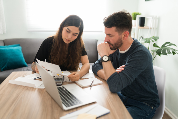 A couple researching how to report foreign gifts with Form 3520.