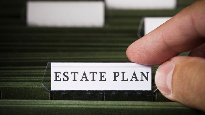 A closeup of a person's estate plan folder in a filing cabinet.